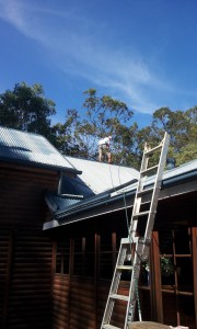 Jai Spraying Roof using harness safety system
